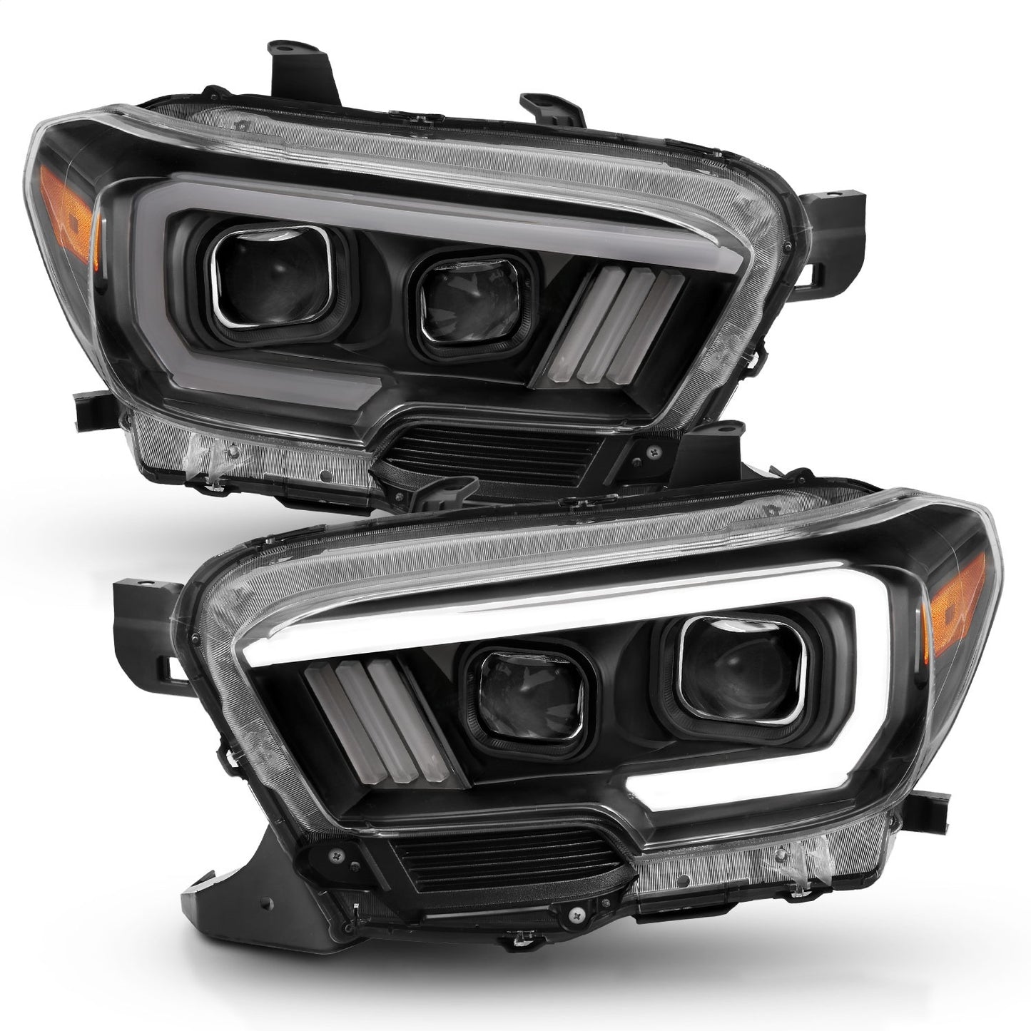 Anzo USA | Projector Headlight Set w/Plank Style Switchback Black w/Amber | Fits Tacoma | 111397