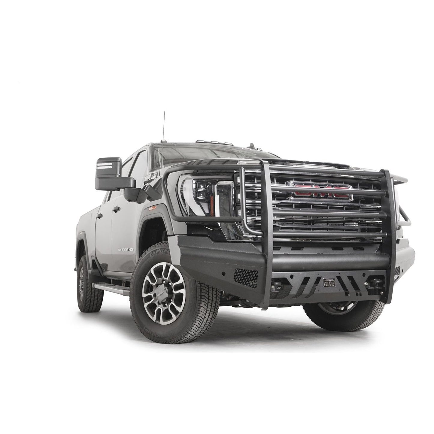 Fab Fours Elite Front Bumper w/ Full Guard Black Steel w/ Sensor Incl. Tow Hooks l GM24-Q6260-1