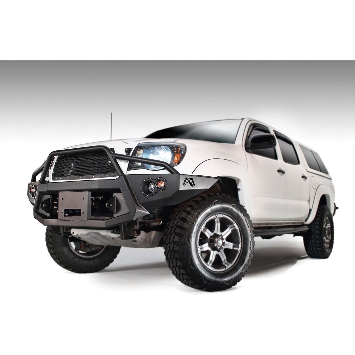 Fab Fours Premium Heavy Duty Winch Front Bumper 2 Stage Black Powder Coated w/Pre-Runner Grill Guard Incl. 1in. D-Ring Mts./Light Cut-Outs w/Hella 90mm Fog Lamps/60mm Turn Signals l TT05-B1552-1