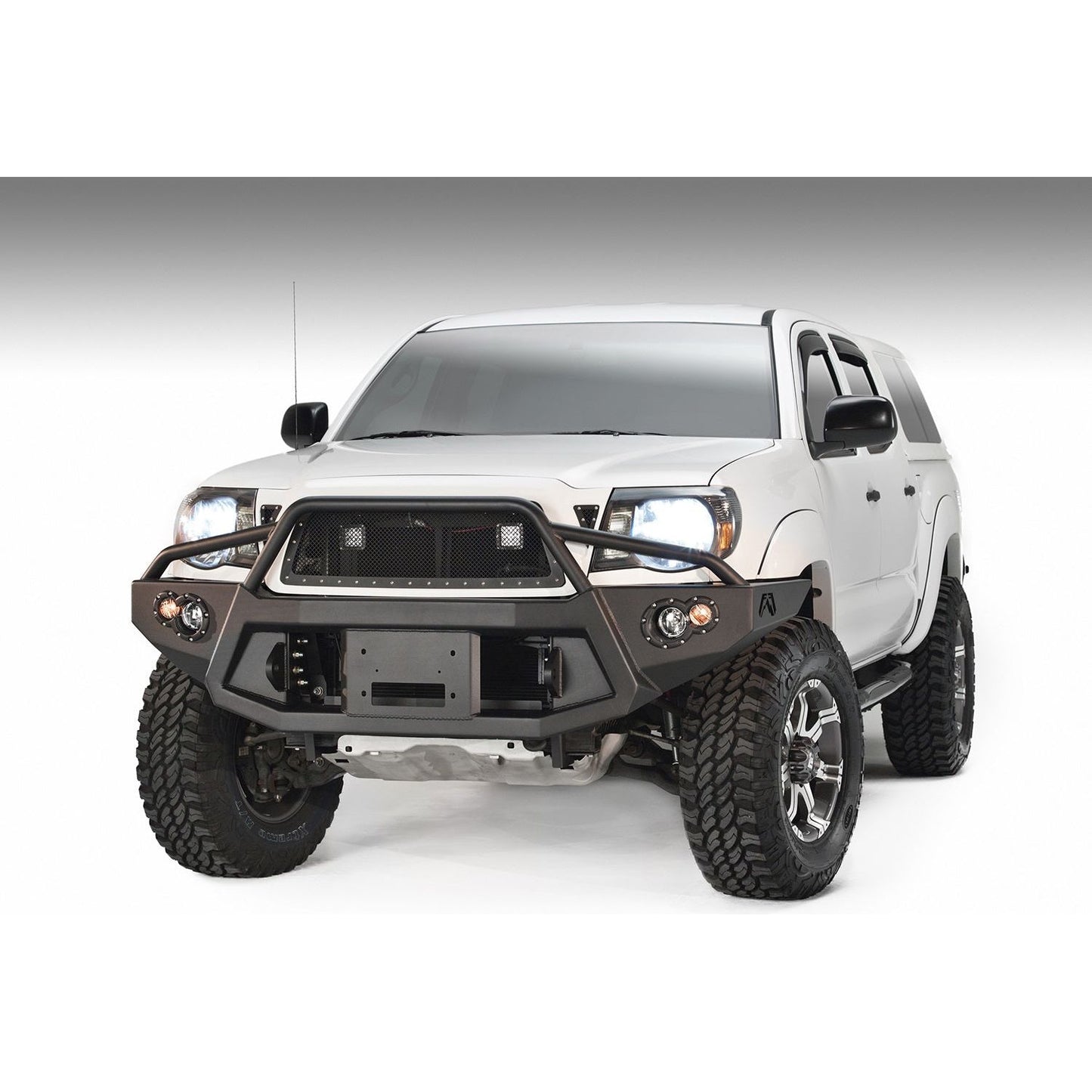 Fab Fours Premium Heavy Duty Winch Front Bumper 2 Stage Black Powder Coated w/Pre-Runner Grill Guard Incl. 1in. D-Ring Mts./Light Cut-Outs w/Hella 90mm Fog Lamps/60mm Turn Signals l TT05-B1552-1