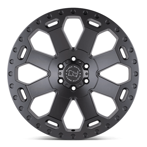 Black Rhino WARLORD Matte Gunmetal wheel with an 8-spoke design and green accents.