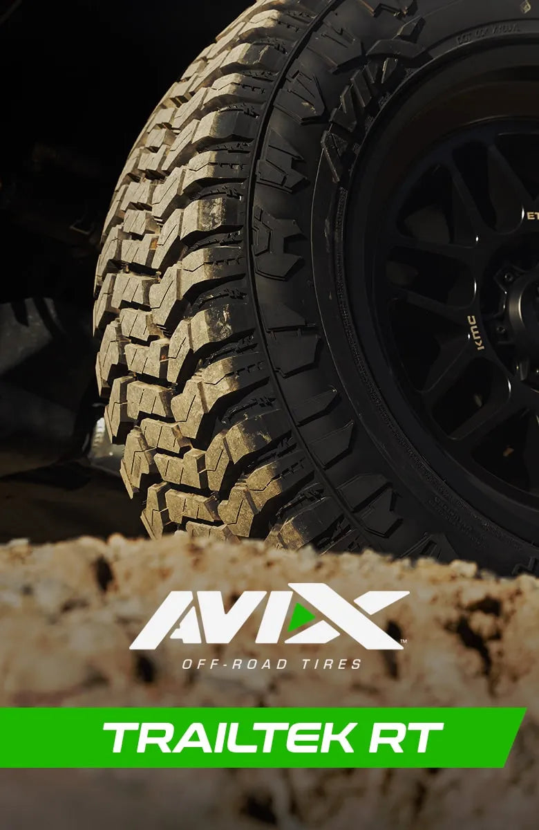 Close-up of AVIX TIRES TrailTek RT tread design on a rugged off-road vehicle.