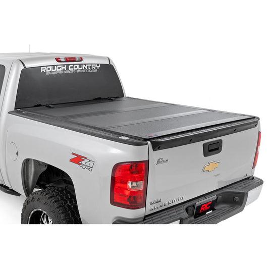 ROUGH COUNTRY Hard Tri-Fold Flip Up Bed Cover | 5'9" Bed | Chevy/GMC 1500 (07-13) | 49113551