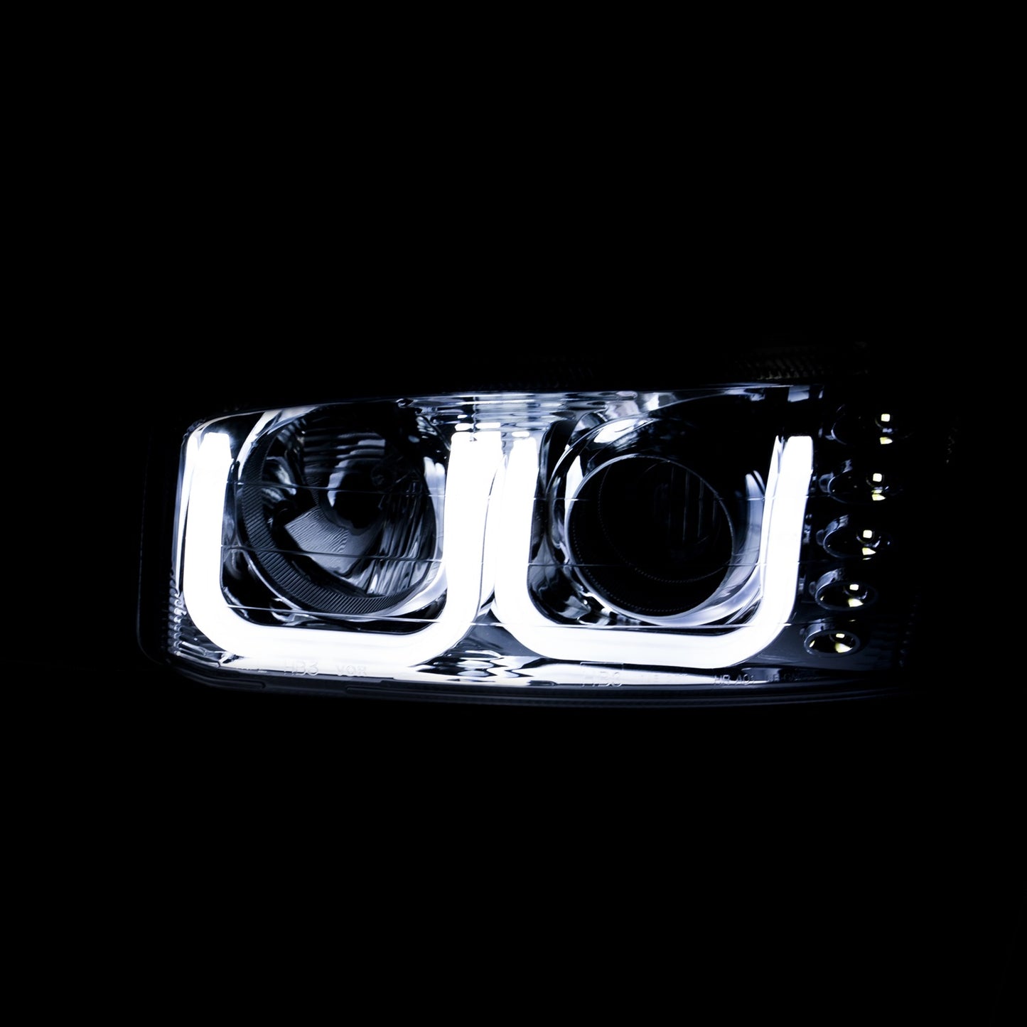 Anzo USA | Projector Headlight Set Clear Lens Black Housing w/U-Bar Pair | Fits Sierra 1500 | 111303