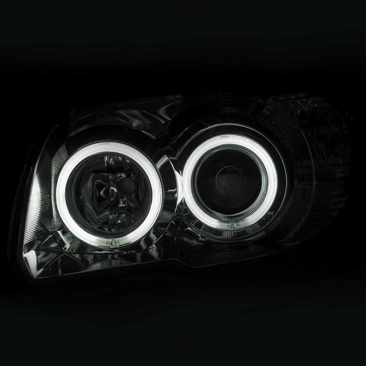 Anzo USA | Projector Headlight Set Clear Lens Chrome Housing w/U-Bar Pair | Fits 4Runner | 111321