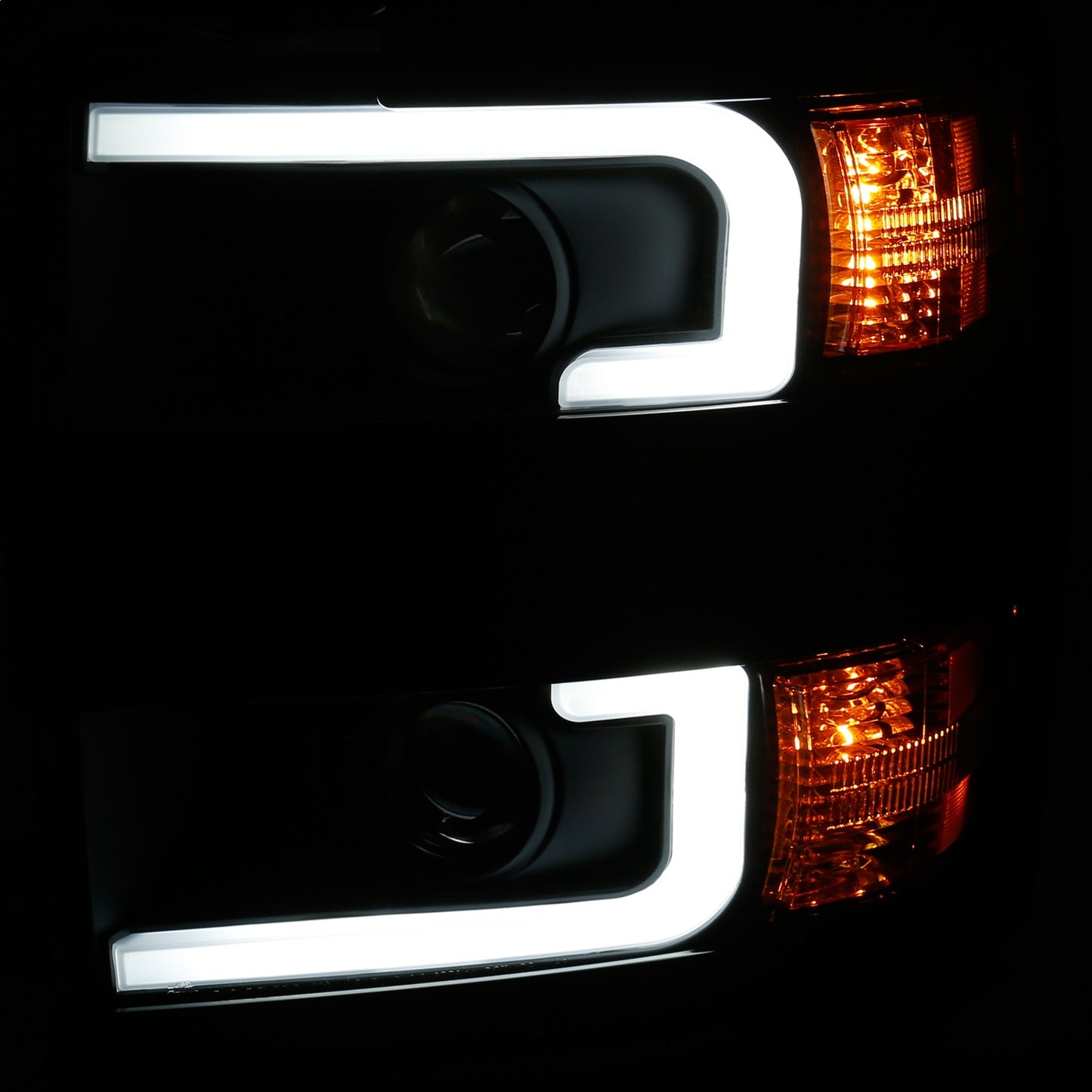 Anzo USA | Projector Headlight Set Clear Lens w/Plank Style Switchback Black w/Amber Black Rim Pair | Fits Silverado 2500 HD | 111364