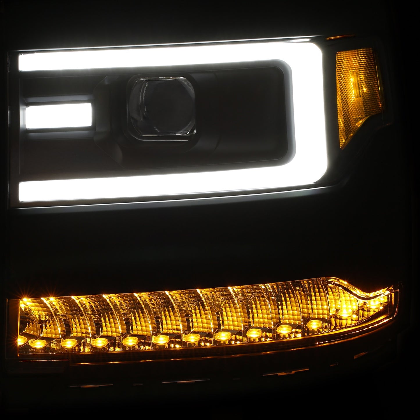 Anzo USA | Projector Headlight Set Clear Lens Black Housing Amber Reflector Pair w/Plank Style Back | Fits Silverado 1500 | 111373