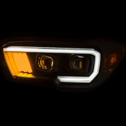 Anzo USA | Projector Headlight Set Plank Style Design Black w/Amber Lens w/Halogen DRL | Fits Tacoma | 111377
