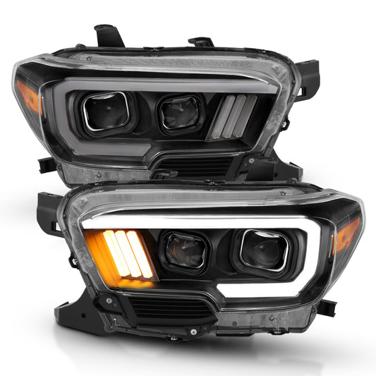 Anzo USA | Projector Headlight Set Clear Lens Black Housing Plank Style Black w/Amber Pair | Fits Tacoma | 111379