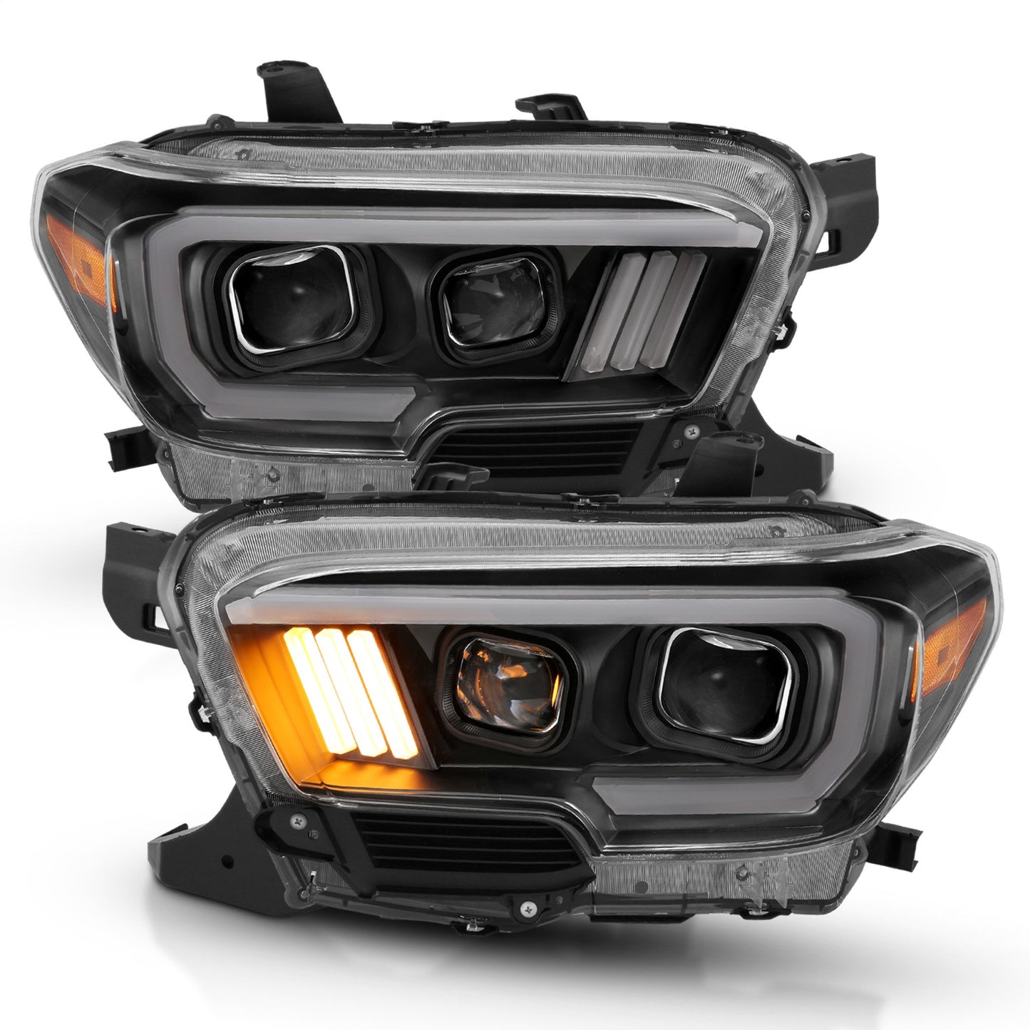 Anzo USA | Projector Headlight Set Clear Lens Black Housing Plank Style Black w/Amber Pair | Fits Tacoma | 111379