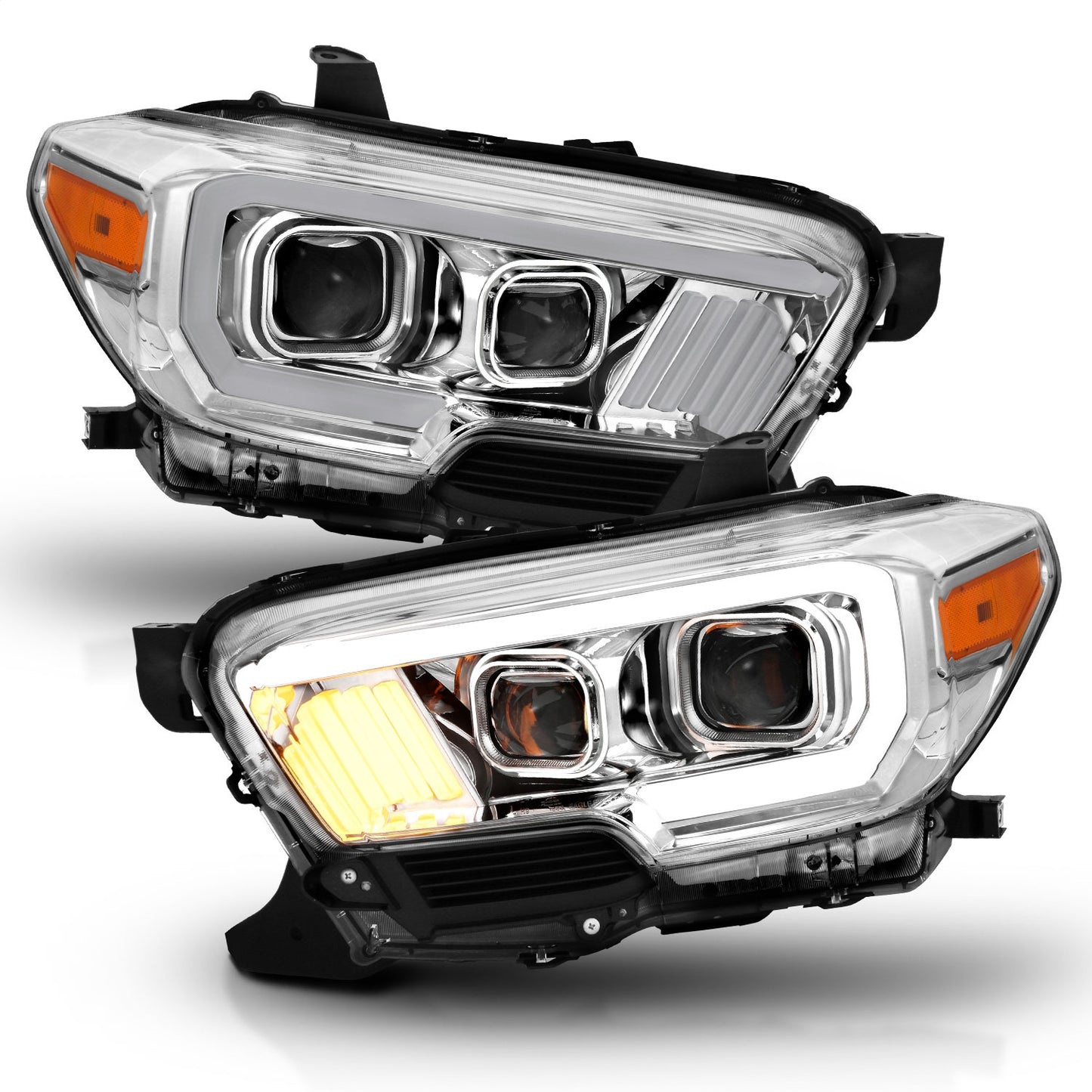Anzo USA | Projector Headlight Set Plank Style Clear Lens Chrome Housing Chrome/Amber Pair | Fits Tacoma | 111380
