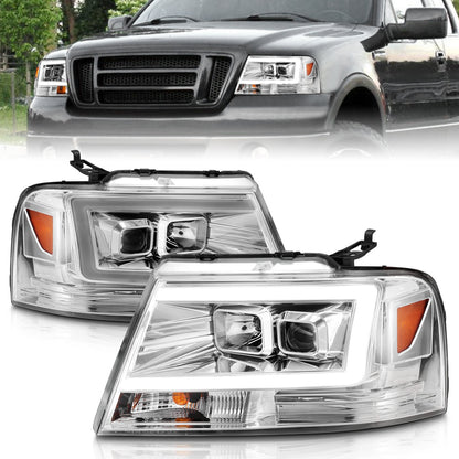 Anzo USA | Projector Headlight Set Clear Lens Chrome Housing w/Light Bar Pair | Fits F-150 | 111542