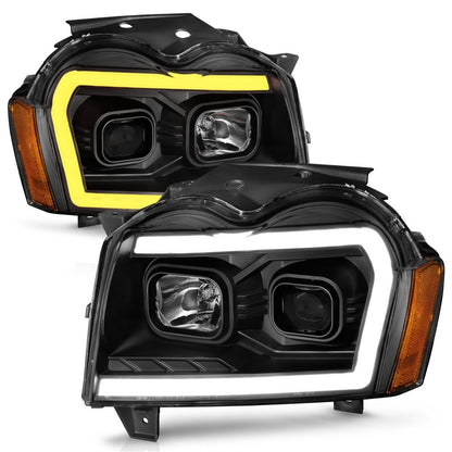 Anzo USA | Projector Headlight Set Black Housing w/Light Bar Switchback | Fits Grand Cherokee | 111543