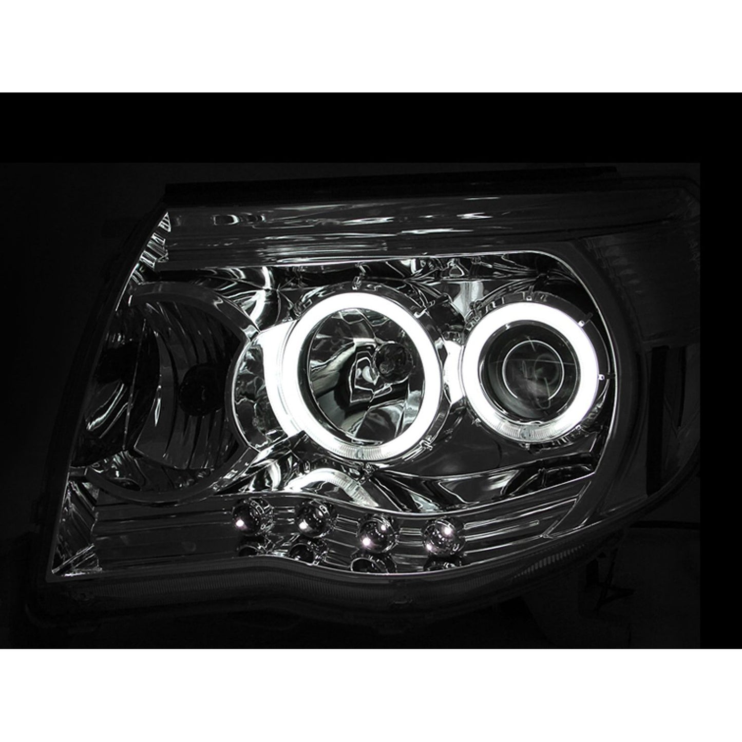 Anzo USA | Projector Headlight Set w/Halo Clear Lens Chrome Housing Pair | Fits Tacoma | 121281