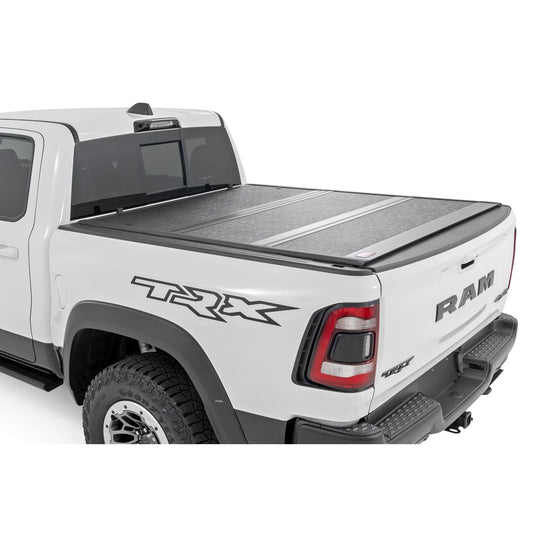 ROUGH COUNTRY Hard Low Profile Bed Cover | 5'7" Bed | No Rambox | Ram 1500 (19-25)/1500 TRX (21-24)  | 47320550B