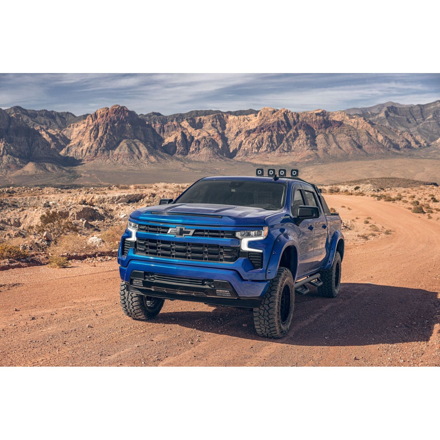 Husky Liners | Pocket Style Fender Flare 4 PC Set For 2019-2026 Silverado 1500 Husky Liners | 2804992 on a blue Silverado truck.