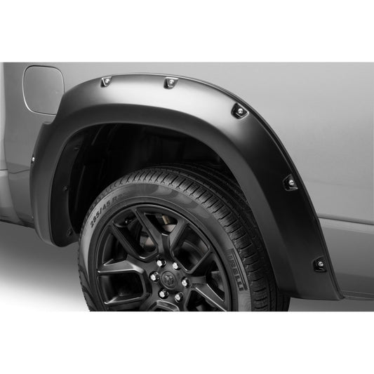 Husky Liners | Pocket Style Fender Flare 4 PC Set For 2025 1500 Husky Liners | 2805943 on a vehicle wheel.