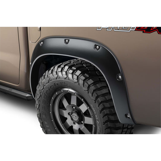 Husky Liners | Pocket Style Fender Flare 4 PC Set For 2022-2026 Frontier Husky Liners | 2807911 on truck tire.
