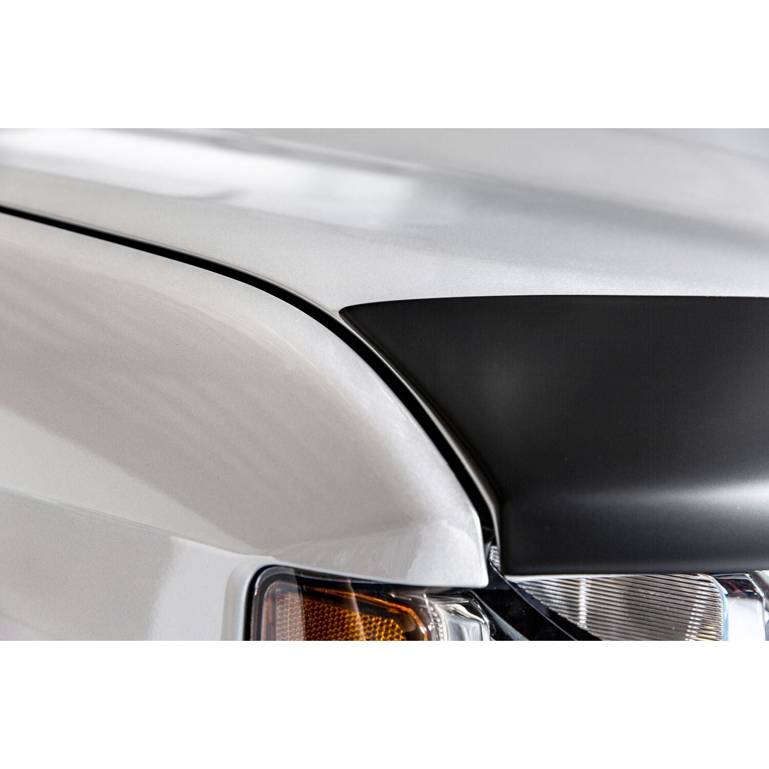 Husky Liners | Aeroskin Hood Protector Matte Black Low Profile For 2019-2025 2500/3500 Husky Liners | 2877189 installed on vehicle hood