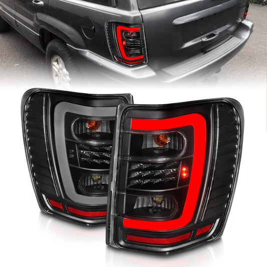 Anzo USA | LED Tail Light Assembly LED Clear Lens Black Housing w/Light Bar Pair | Fits Grand Cherokee | 311394
