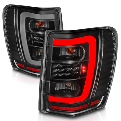 Anzo USA | LED Tail Light Assembly LED Clear Lens Black Housing w/Light Bar Pair | Fits Grand Cherokee | 311394