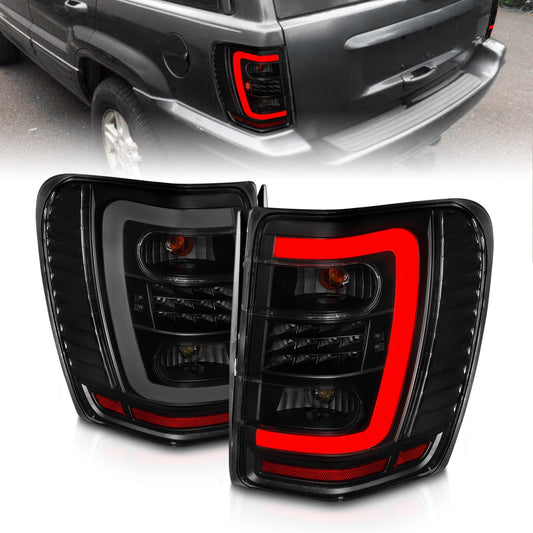 Anzo USA | LED Tail Light Assembly LED Smoke Lens Black Housing w/Light Bar Pair | Fits Grand Cherokee | 311395