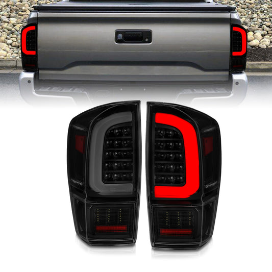 Anzo USA | LED Tail Light Assembly Smoke Lens Black Housing w/Light Bar Sequential | Fits Tacoma | 311401