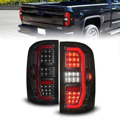 Anzo USA | LED Tail Light Assembly LED Smoke Lens Black Housing w/Sequential Signal w/C-Light Bar Pair | Fits Sierra 1500 | 311465
