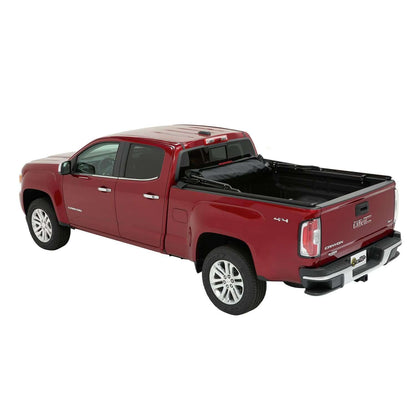 BESTOP | Supertop Truck Bed Cap 2 For Chevy/GMC 2015-2024 Colorado/Canyon 5.0 Foot Black Diamond PVC Coated Sailcloth No Drill Bestop | 77323-35 mounted on a red GMC truck.
