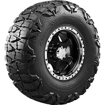 Nitto Tires | Mud Grappler tire showcasing aggressive tread for off-road traction and durability.