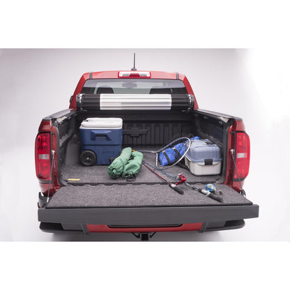BedRug Bedmat For Spray-In Or No 23-25 Colorado/Canyon 5' Bed 3/4 Inch Thick Bed Mat - Charcoal (BMB23CCS) in truck bed with gear.