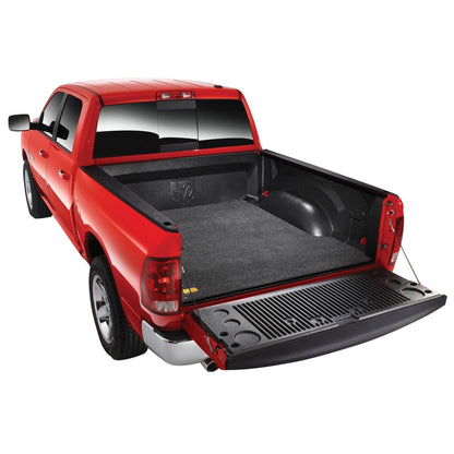 BedRug 07-18 - Charcoal (19 Legacy/Limited) Silverado/Sierra 6'6" Bed w/Cargo Channel System Bed Mat in a truck bed.