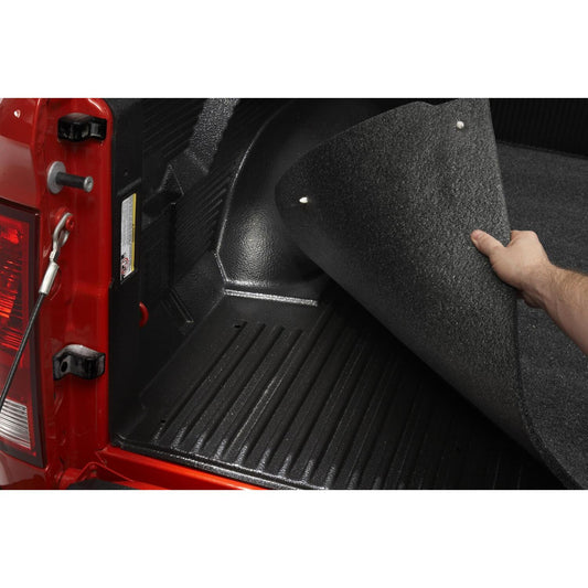 BedRug 19+ Silverado/Sierra 5'9" Bed w/o Carbonpro Bed Mat - Charcoal (BMC19CCD) installation in truck bed.
