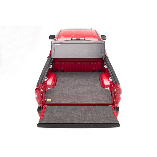 BedRug Bedmat For Spray-In Or No 07-21 Toyota Tundra 5'6" Bed 3/4 Inch Thick Bed Mat - Charcoal (BMY07SBS) in a pickup truck bed.