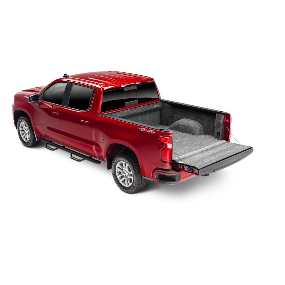 BedRug Truck 20+ GM HD Silverado/Sierra 6'9" Bed w/ Multi-Pro Tailgate Bed Liner w/ Tailgate Mat - Charcoal (BRC20SBMPK) in red truck.