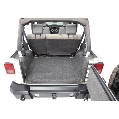 BedRug Jeep 07-10 Jeep JK 2Dr Rear 5Pc Cargo Kit - Charcoal (Includes Tailgate & Tub Liner) installed in Jeep trunk.