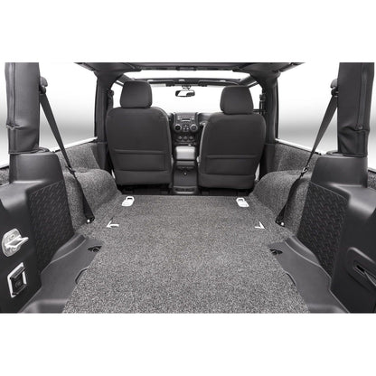 BedRug Jeep 11-18 Jeep JK 2Dr Rear 5Pc Cargo Kit - Charcoal installed in the back of a Jeep JK.