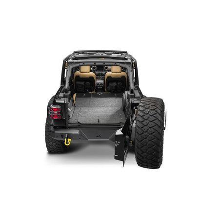 BedRug 2018-2026 Jeep Wrangler 2 Door Bed Liner - Charcoal (BRJL18R2) installed in a Jeep Wrangler interior.