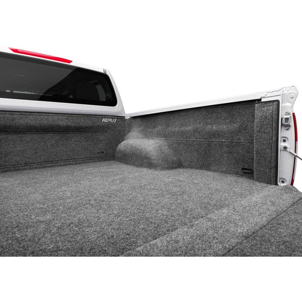 BedRug 04+ Nissan Titan Crew Cab 5.5' Bed Liner w/ Tailgate Mat - Charcoal (BRN04CCK) installed in truck bed.