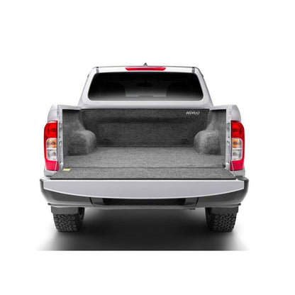 BedRug 04+ Nissan Titan Crew Cab 5.5' Bed Liner w/ Tailgate Mat - Charcoal (BRN04CCK) installed in truck bed.