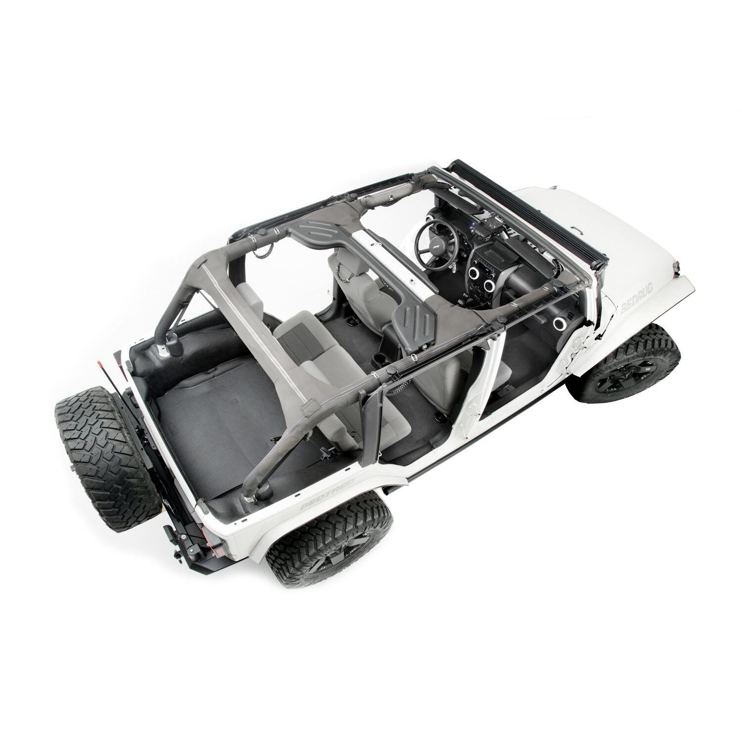 BedRug Jeep Bedtred 11-18 JK Unltd 4Dr Rear 5Pc Cargo Kit Rear Kit Incl. Drivers Wheel Well/ Passengers Wheel Well/ Rear Cargo Floor/ Tailgate And Tub Liner Bed Liner - Charcoal (BTJK11R4) installed in a Jeep interior.