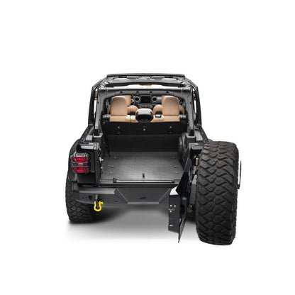 BedRug 2018-2026 Jeep Wrangler 4 Door Bed Liner - Charcoal (BTJL18R4) installed in a Jeep with a rugged interior.