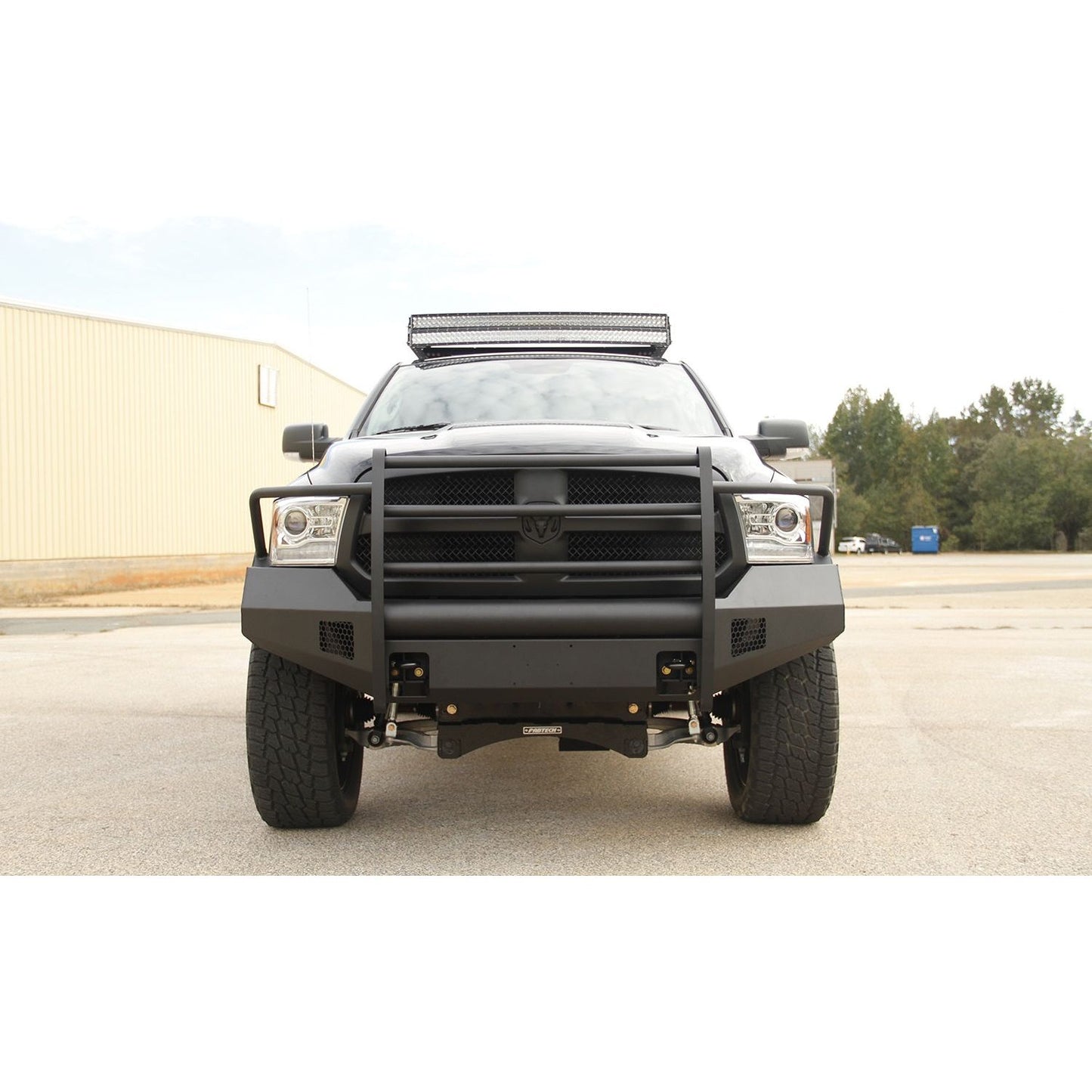 Fab Fours Elite Front Bumper 2 Stage Black Powder Coated w/Full Grill Guard And Tow Hooks l DR13-R2960-1