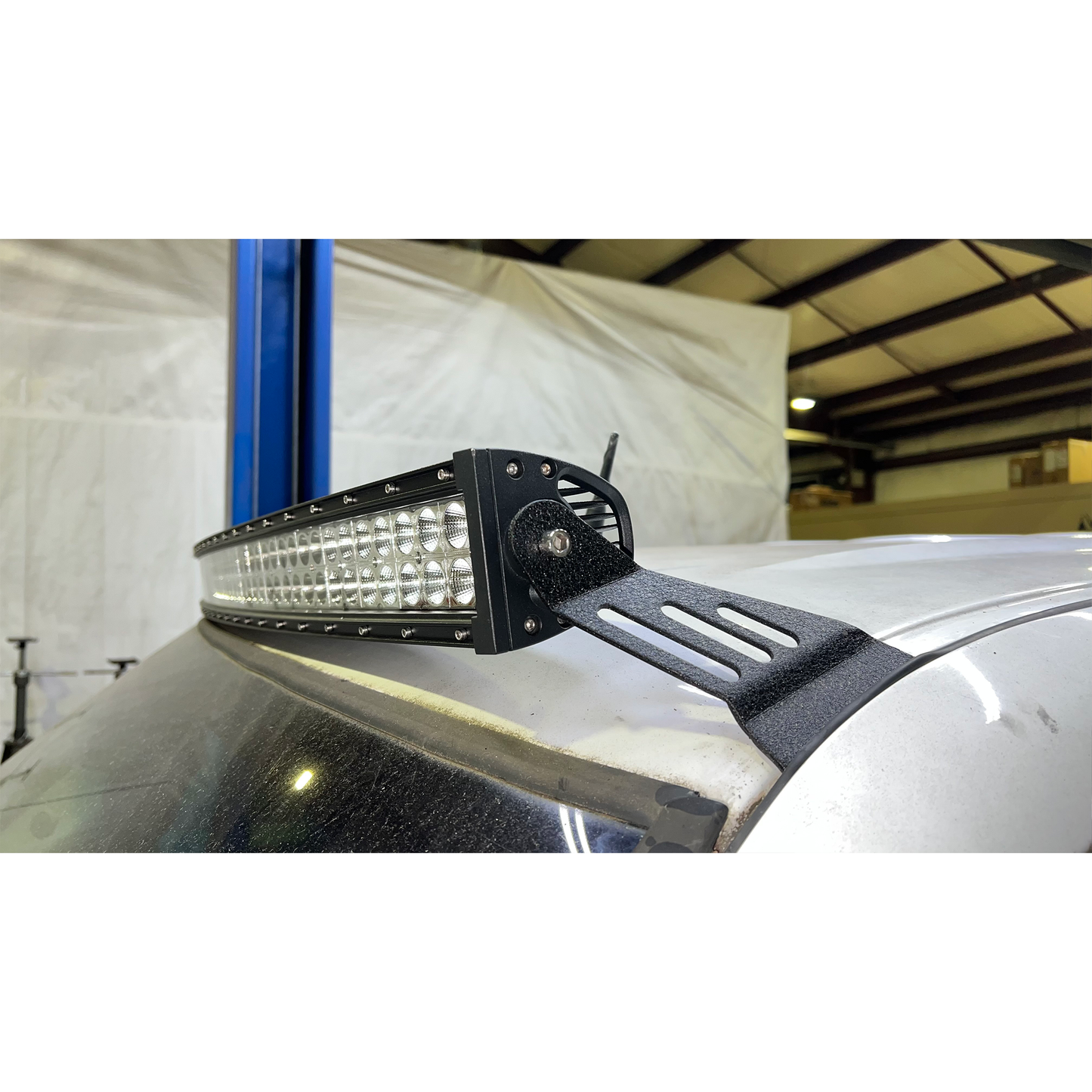 FISHBONE OFFROAD | 99-06 Silverado/Tahoe/Suburban/Sierra/Yukon/Avalanche Roof Mounted Lightbar Brkt For 50In Light Bar | FB21354