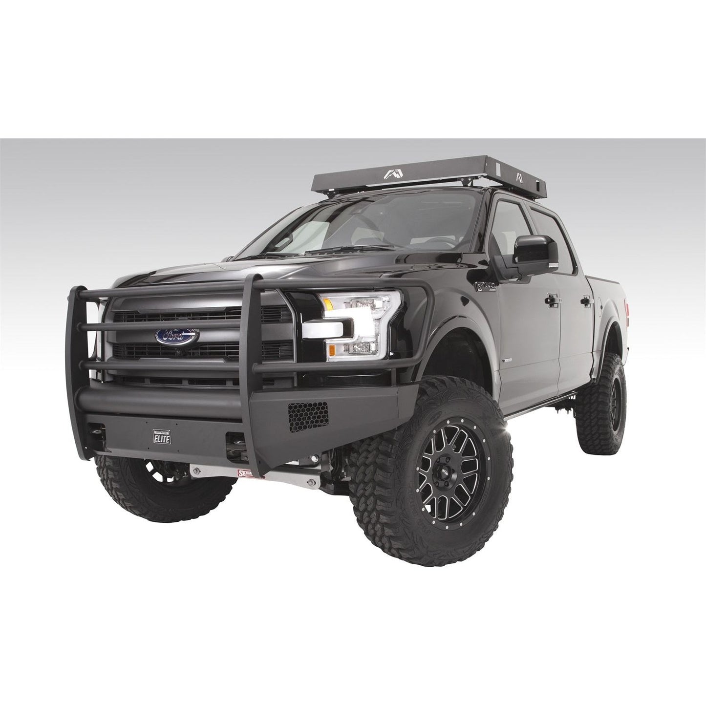 Fab Fours Elite Front Bumper 2 Stage Black Powder Coated w/Full Grill Guard Incl. Light Cut-Outs And Tow Hooks l FF15-R3250-1
