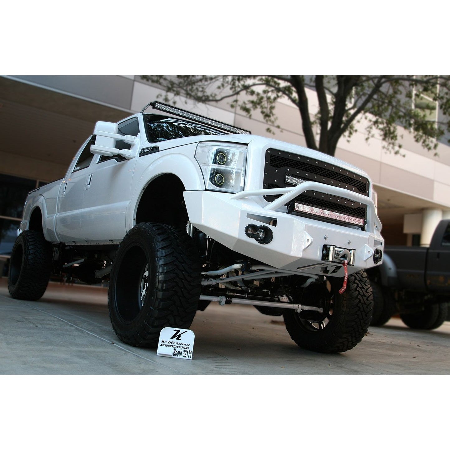 Fab Fours Premium Heavy Duty Winch Front Bumper 2 Stage Black Powder Coated w/Pre-Runner Grill Guard Incl. 1in. D-Ring Mts./Light Cut-Outs w/Hella 90mm Fog Lamps/60mm Turn Signals l FS11-A2552-1