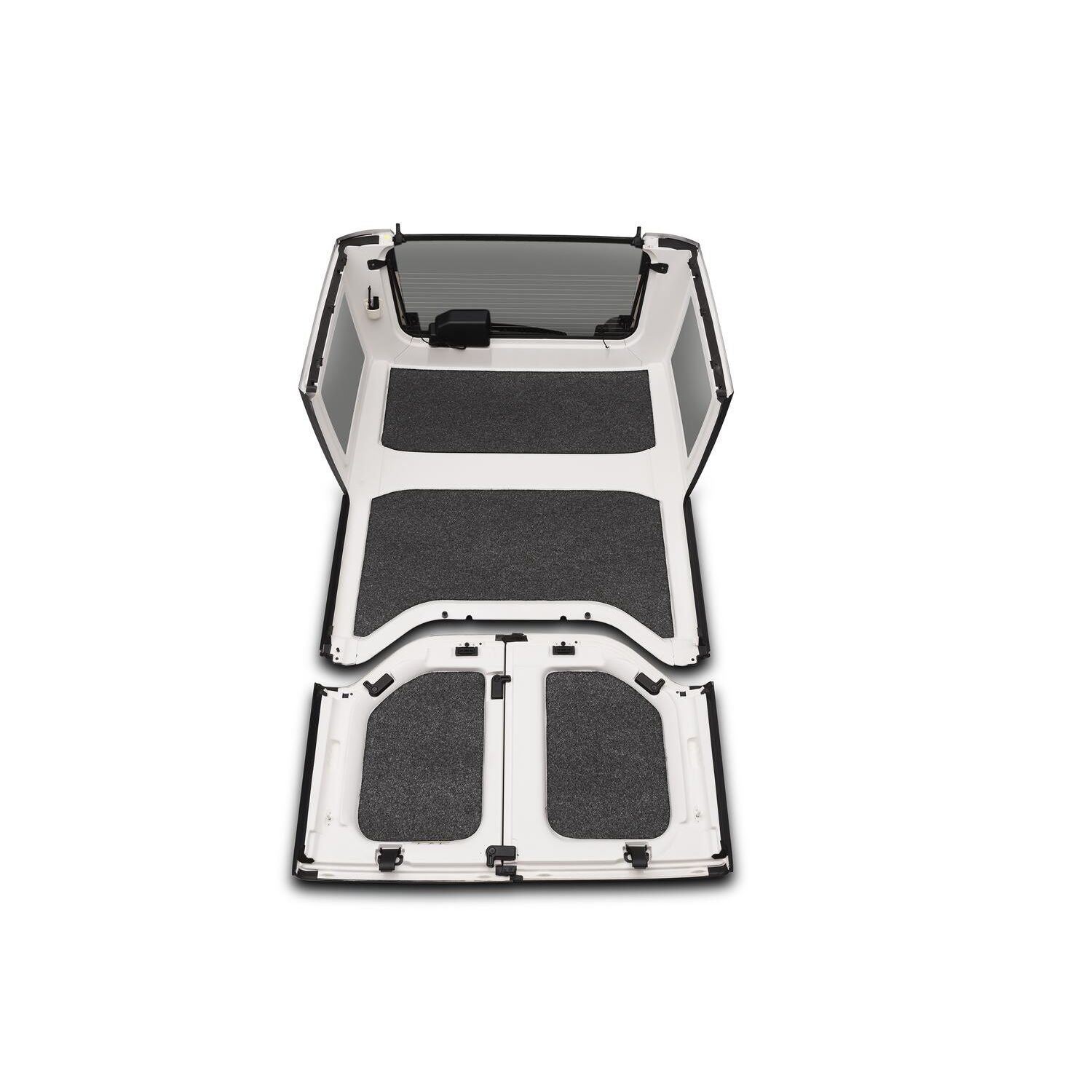 BedRug 2018-2026 Jeep Wrangler 4 Door Bed Liner - Charcoal (HLJL184DRK) installed in a Jeep Wrangler interior.