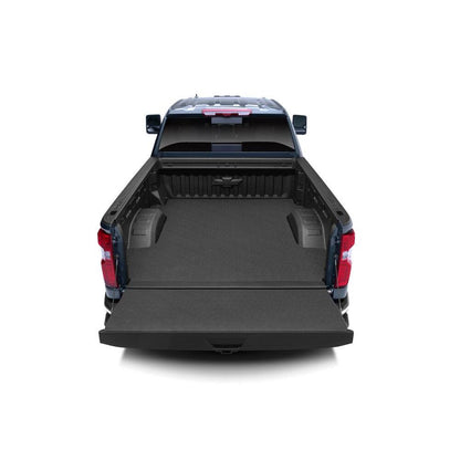 BedRug 20+ GM T1Xx HD 6'9" Bed w/o Multi-Pro Tailgate Impact Bed Mat - Charcoal (IMC20SBS) installed in truck bed view.