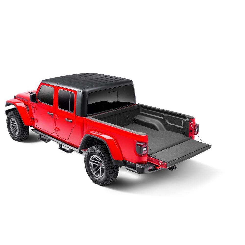 2020-2025 Jeep Gladiator with BedRug Impact Bed Mat - Charcoal (IMJ20SBS) displayed in a truck bed.