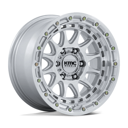 KMC KM556 CRUX Gloss Silver W/ Machined Face wheel showcasing its rugged design and durability for off-road vehicles.